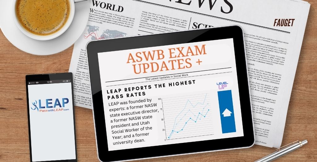 Desk with coffee, iPad, phone and newspaper with LEAP logo and the title, "ASWB Exam Updates"